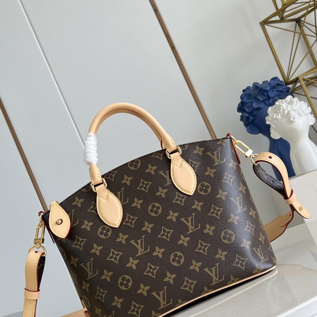 Louis Vuitton Neo Lockit in Monogram Canvas with Vachetta Leather Trim and Zipper for Handheld Carry