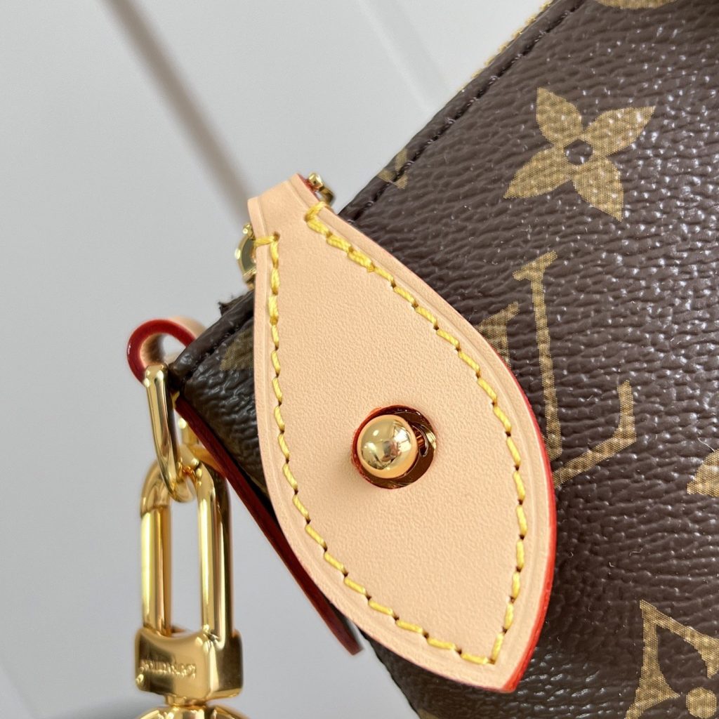 Louis Vuitton Neo Lockit in Monogram Canvas with Vachetta Leather Trim and Zipper for Handheld Carry