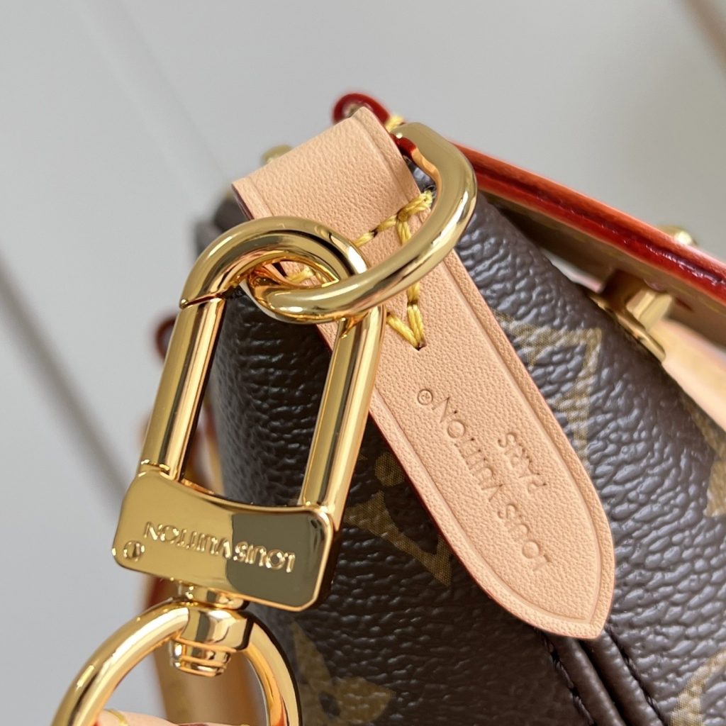 Louis Vuitton Neo Lockit in Monogram Canvas with Vachetta Leather Trim and Zipper for Handheld Carry