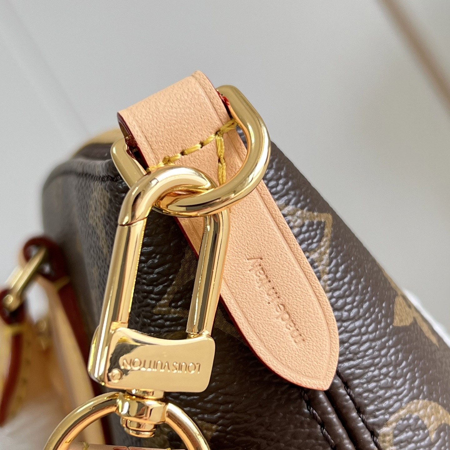 Louis Vuitton Neo Lockit in Monogram Canvas with Vachetta Leather Trim and Zipper for Handheld Carry