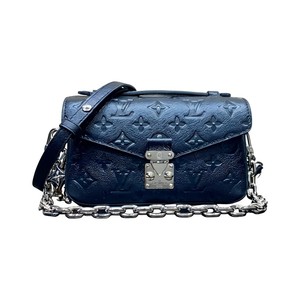 Louis Vuitton Pochette Métis in Monogram Eclipse Calfskin with Turn-lock and Zipper Closure