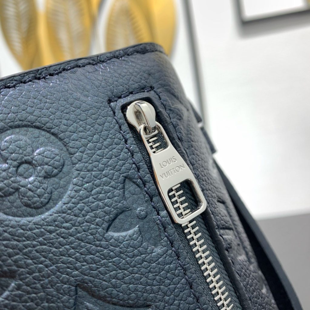 Louis Vuitton Pochette Métis in Monogram Eclipse Calfskin with Turn-lock and Zipper Closure