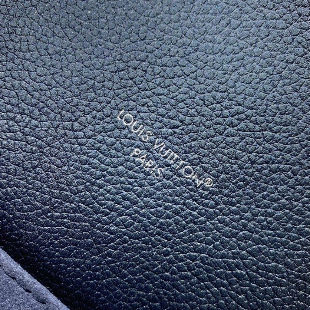 Louis Vuitton Pochette Métis in Monogram Eclipse Calfskin with Turn-lock and Zipper Closure