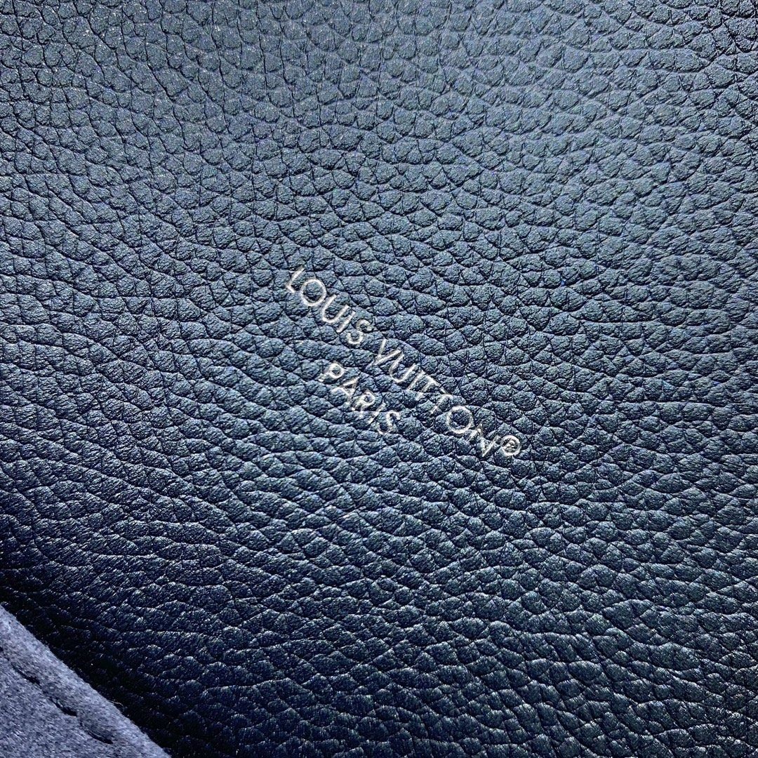 Louis Vuitton Pochette Métis in Monogram Eclipse Calfskin with Turn-lock and Zipper Closure