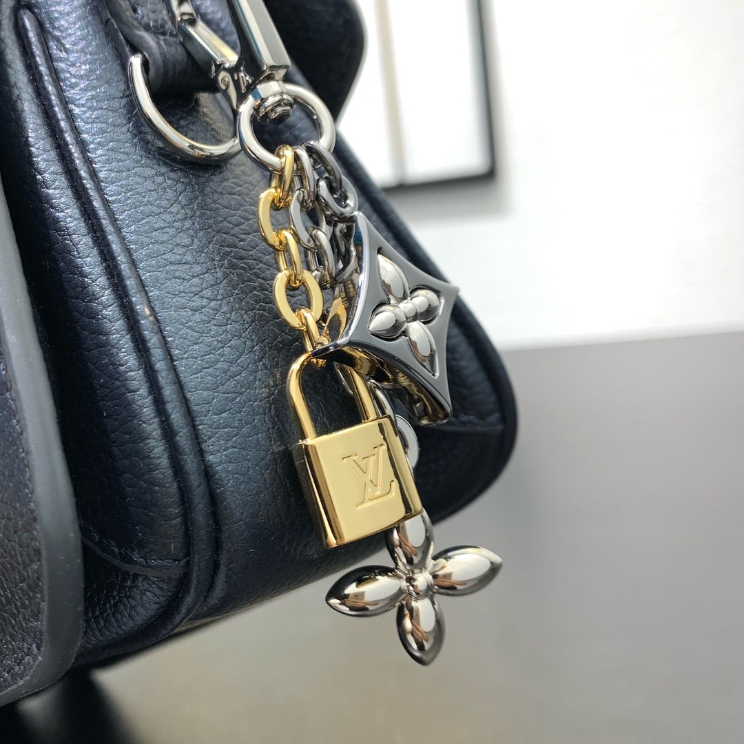 Louis Vuitton Pochette Métis in Monogram Eclipse Calfskin with Turn-lock and Zipper Closure