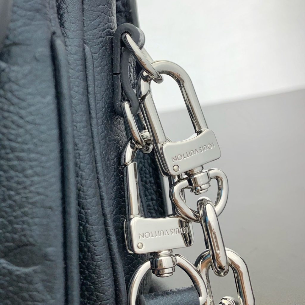Louis Vuitton Pochette Métis in Monogram Eclipse Calfskin with Turn-lock and Zipper Closure