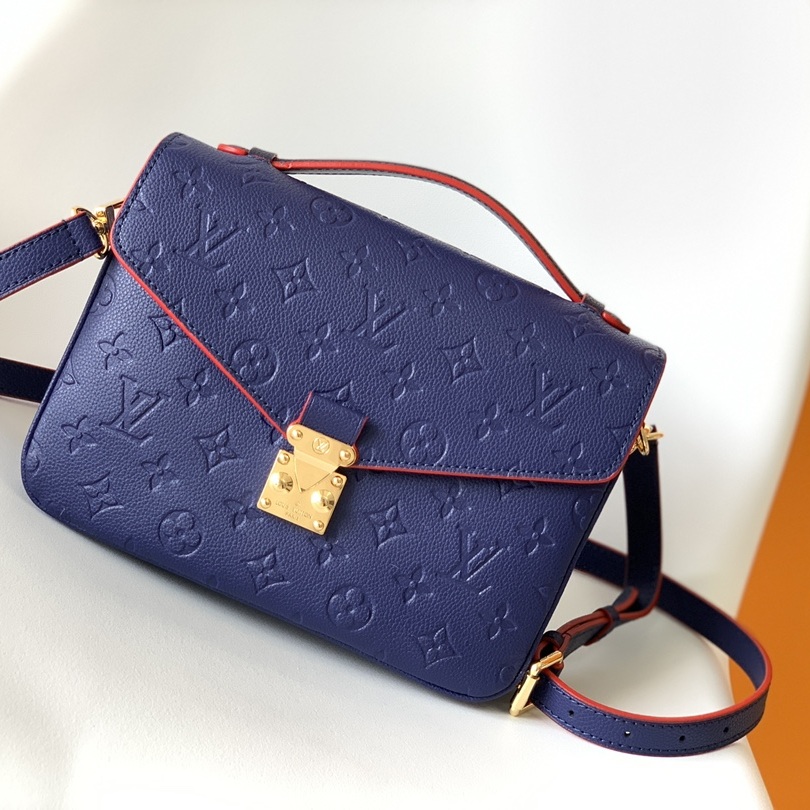 Louis Vuitton Pochette Métis in Monogram Empreinte Calfskin with Twist-lock Flap and Zipper Closure