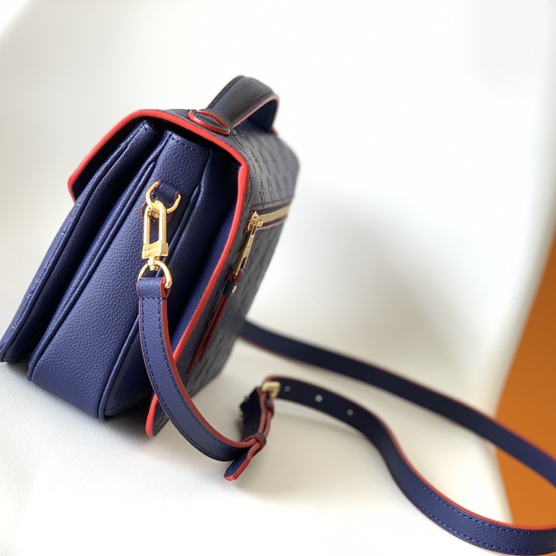 Louis Vuitton Pochette Métis in Monogram Empreinte Calfskin with Twist-lock Flap and Zipper Closure