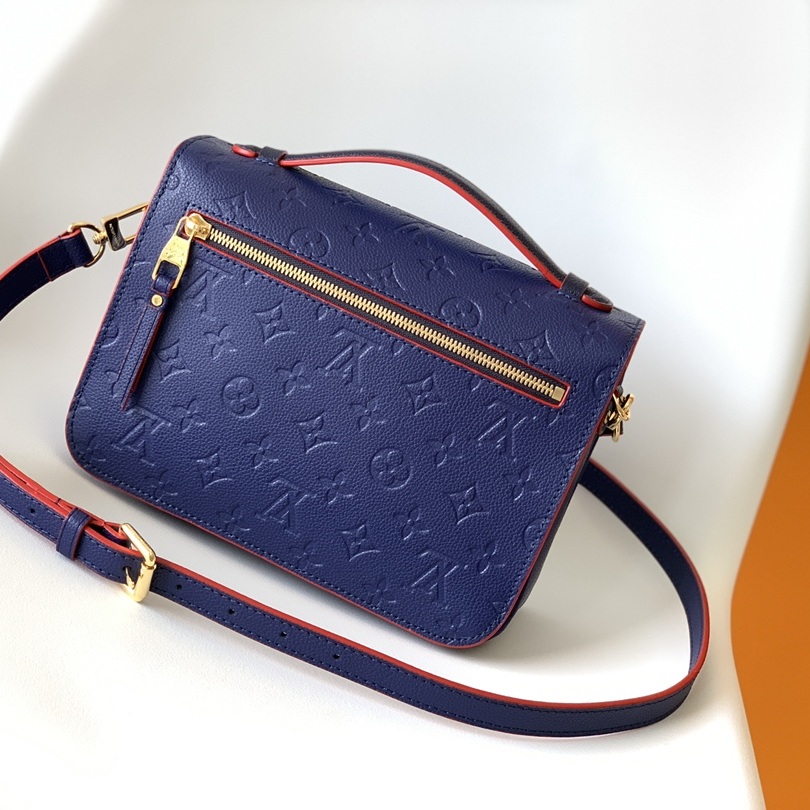 Louis Vuitton Pochette Métis in Monogram Empreinte Calfskin with Twist-lock Flap and Zipper Closure