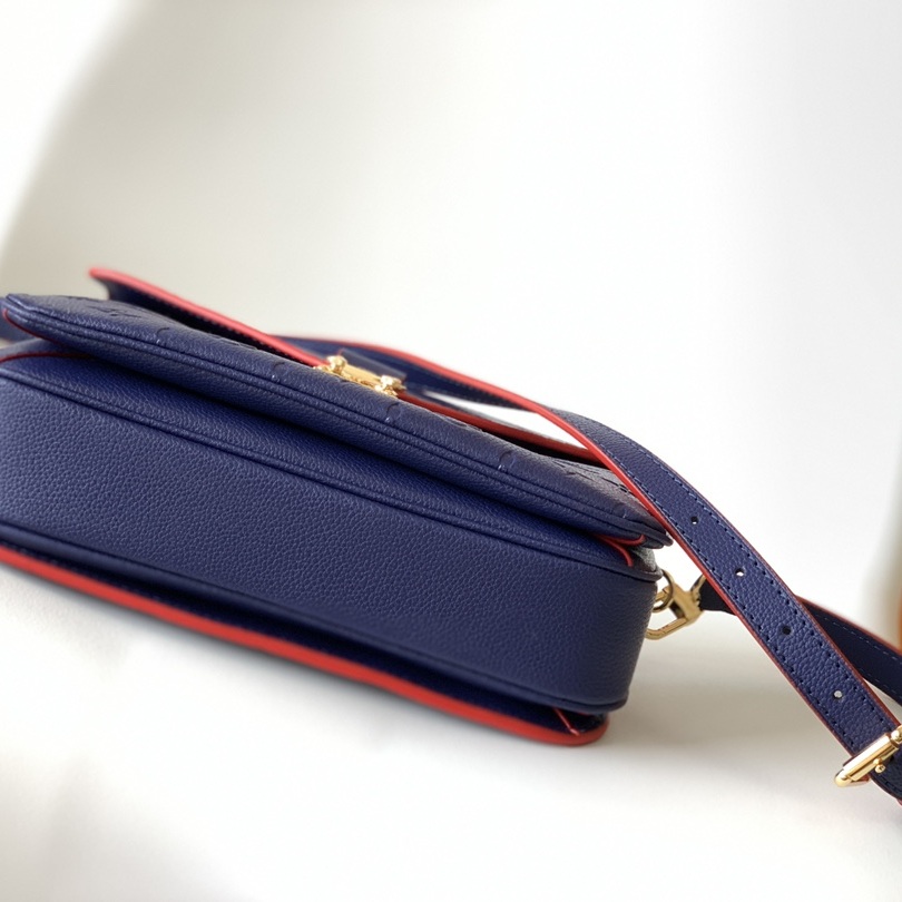 Louis Vuitton Pochette Métis in Monogram Empreinte Calfskin with Twist-lock Flap and Zipper Closure
