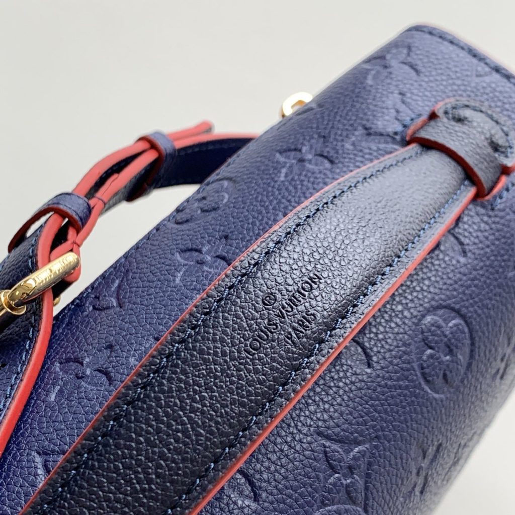 Louis Vuitton Pochette Métis in Monogram Empreinte Calfskin with Twist-lock Flap and Zipper Closure