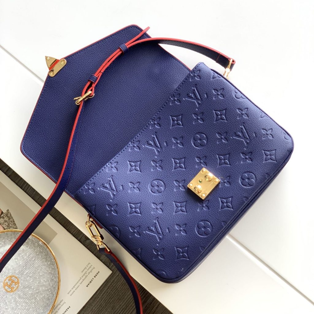 Louis Vuitton Pochette Métis in Monogram Empreinte Calfskin with Twist-lock Flap and Zipper Closure