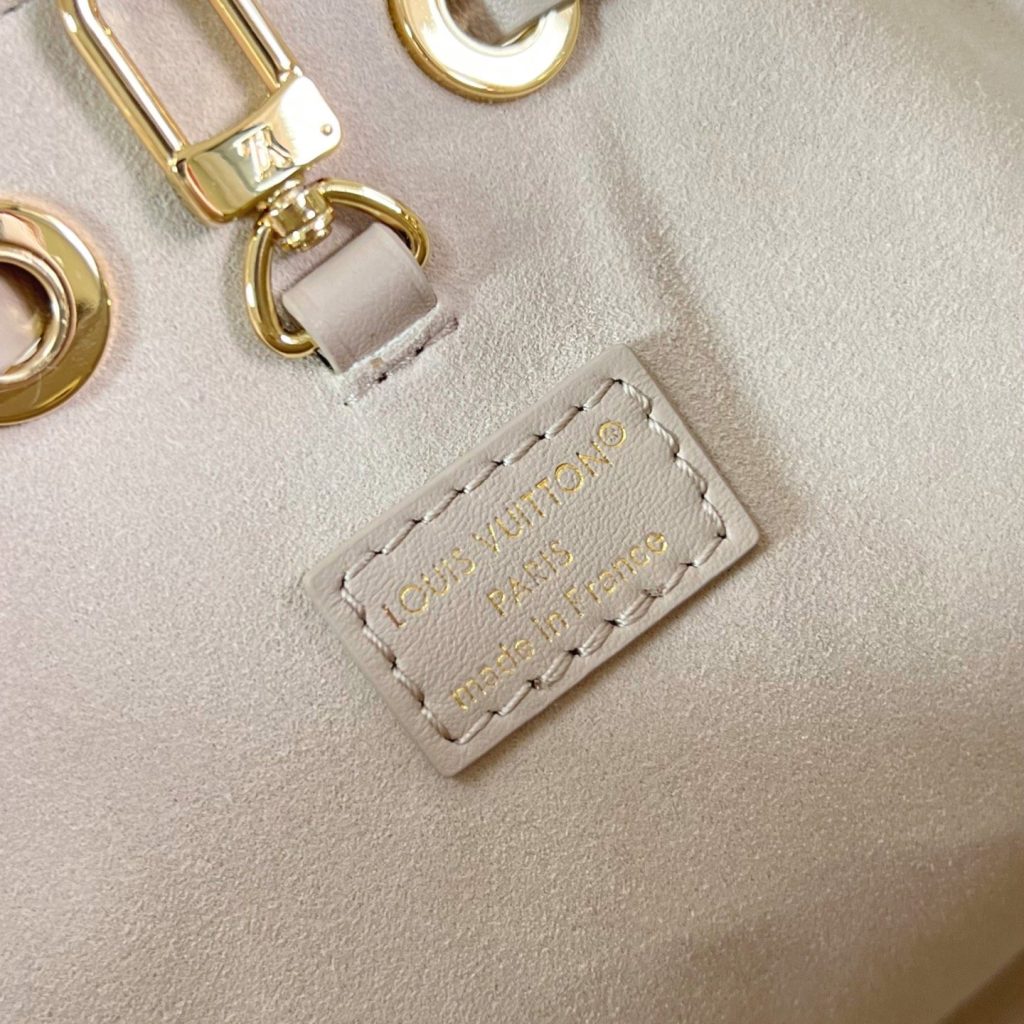 Louis Vuitton Coussin in Monogram Embossed Lambskin with Drawstring Closure for Shoulder BagCrossbod