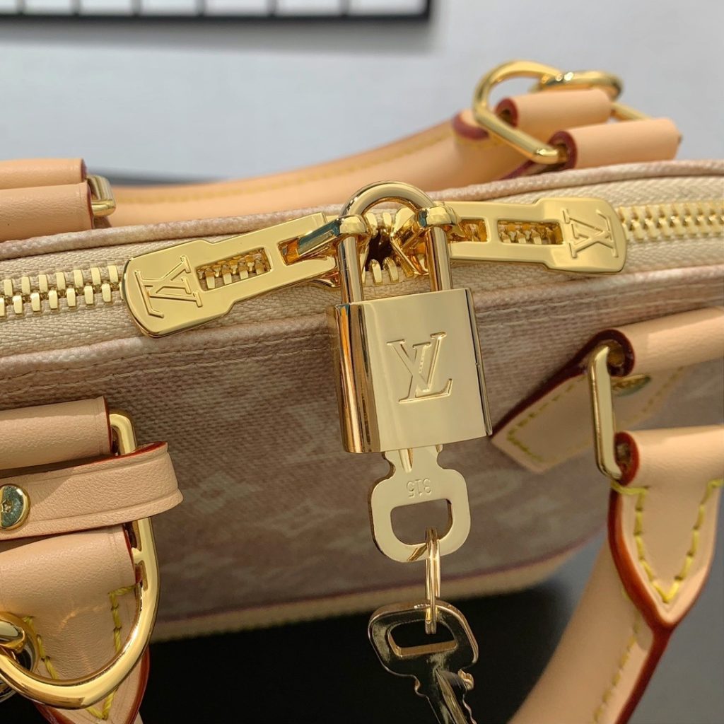 Louis Vuitton Alma BB in Monogram Eclipse Canvas with Vachetta Leather Trim and Zipper for Handheld
