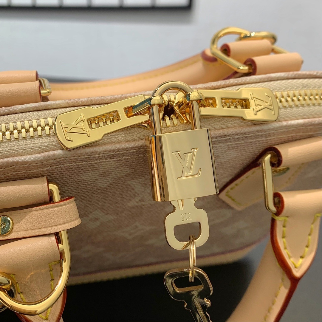 Louis Vuitton Alma BB in Monogram Eclipse Canvas with Vachetta Leather Trim and Zipper for Handheld