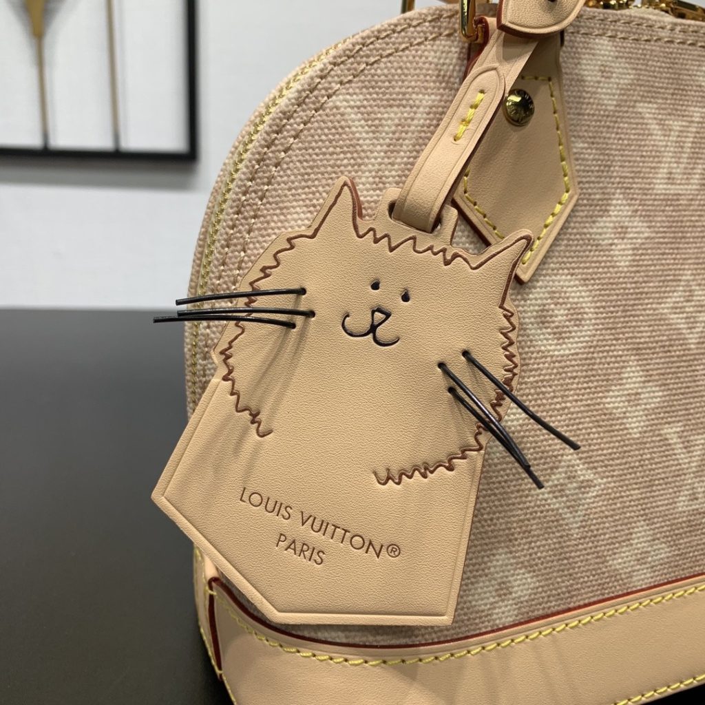 Louis Vuitton Alma BB in Monogram Eclipse Canvas with Vachetta Leather Trim and Zipper for Handheld