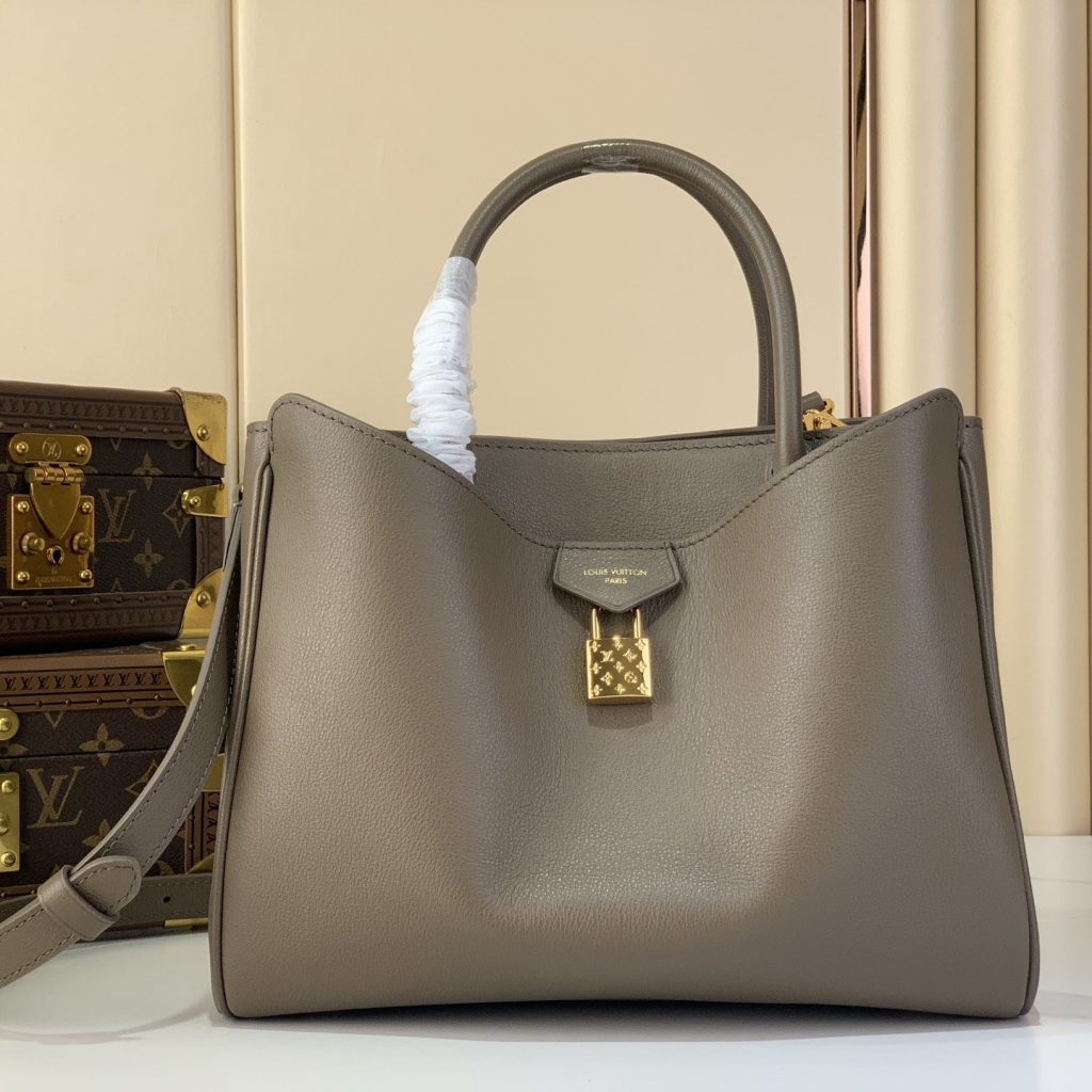 Louis Vuitton Vendome Pochette in Monogram Eclipse Leather with Zipper Closure for Handheld Carry