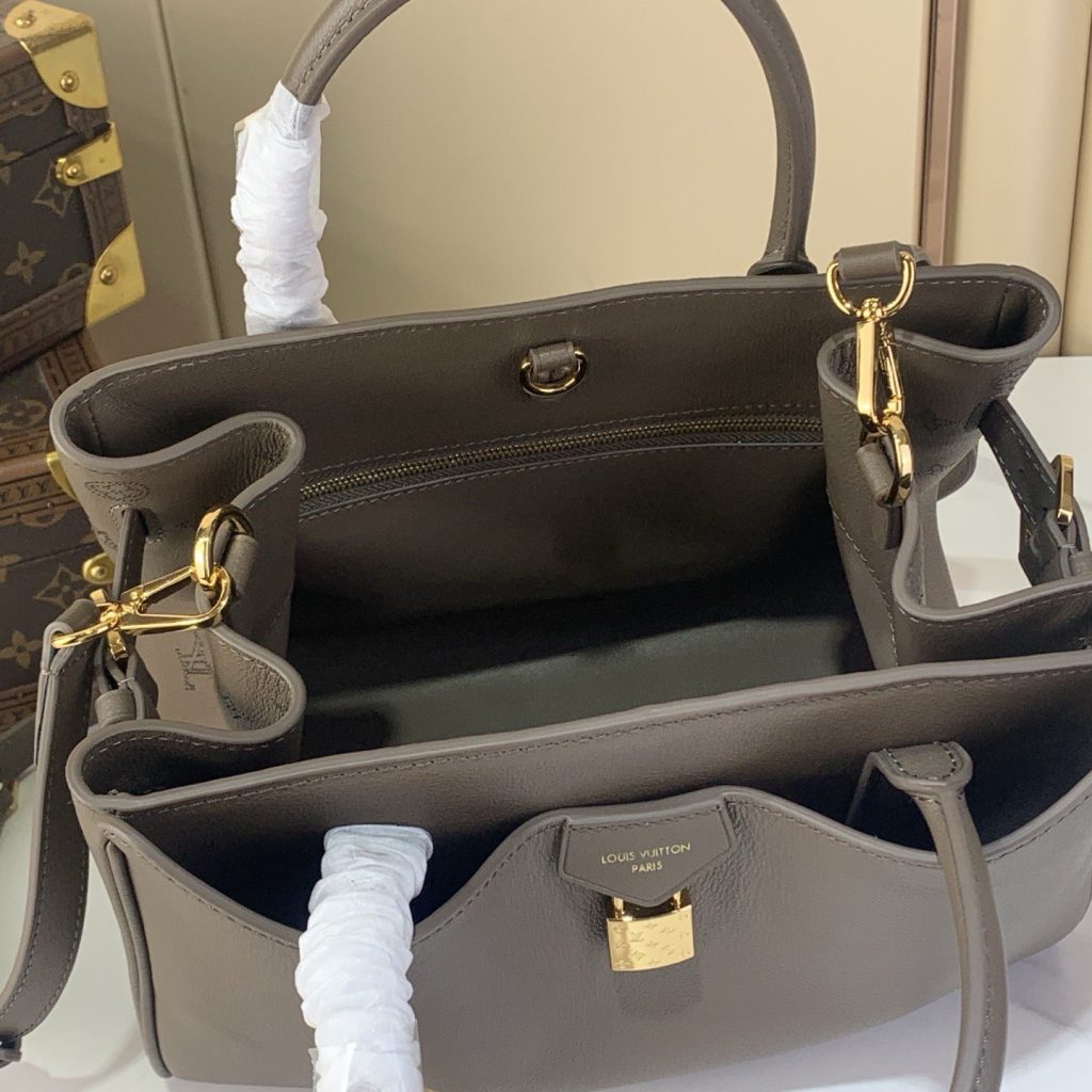 Louis Vuitton Vendome Pochette in Monogram Eclipse Leather with Zipper Closure for Handheld Carry