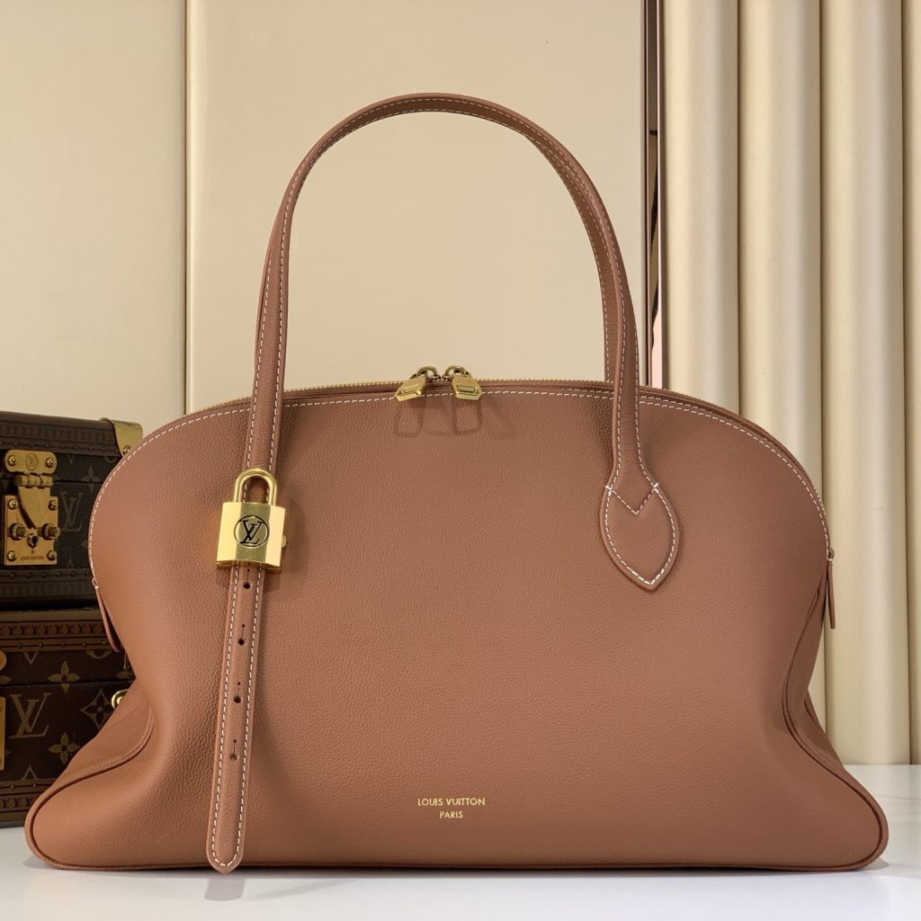 Louis Vuitton Sac Low Key in Grained Calfskin with Zipper Closure for Hand CarryShoulder Carry Duffl