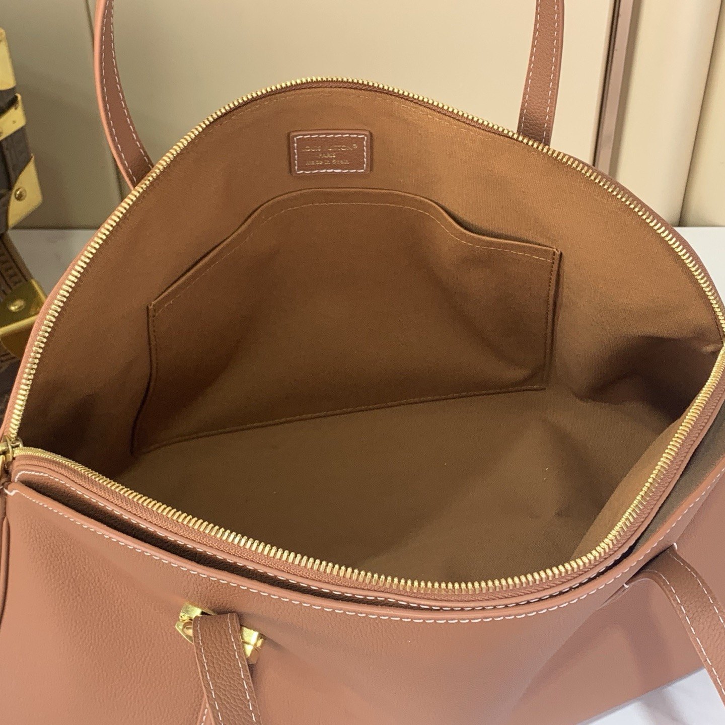 Louis Vuitton Sac Low Key in Grained Calfskin with Zipper Closure for Hand CarryShoulder Carry Duffl