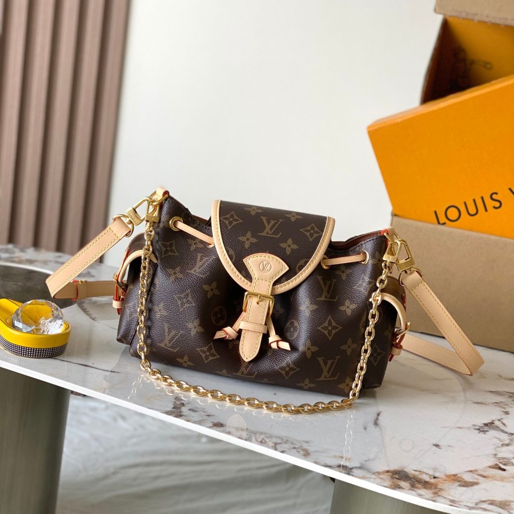 Louis Vuitton Odysée in Monogram Canvas with Drawstring and Flap for Shoulder Crossbody Carry