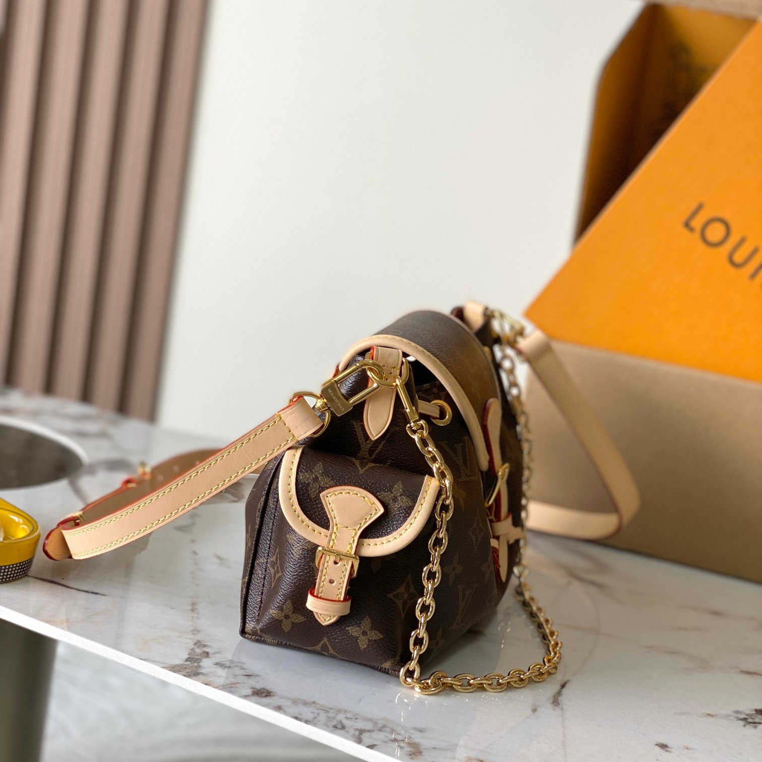 Louis Vuitton Odysée in Monogram Canvas with Drawstring and Flap for Shoulder Crossbody Carry