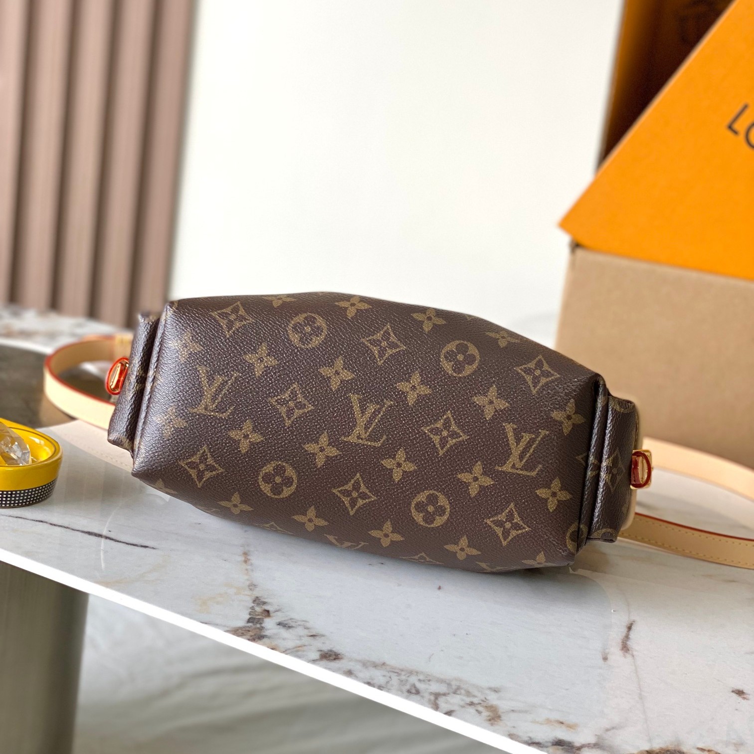 Louis Vuitton Odysée in Monogram Canvas with Drawstring and Flap for Shoulder Crossbody Carry