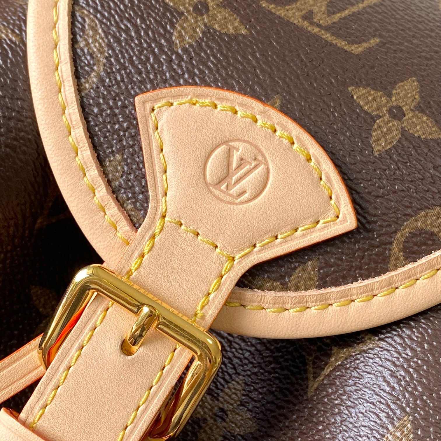 Louis Vuitton Odysée in Monogram Canvas with Drawstring and Flap for Shoulder Crossbody Carry
