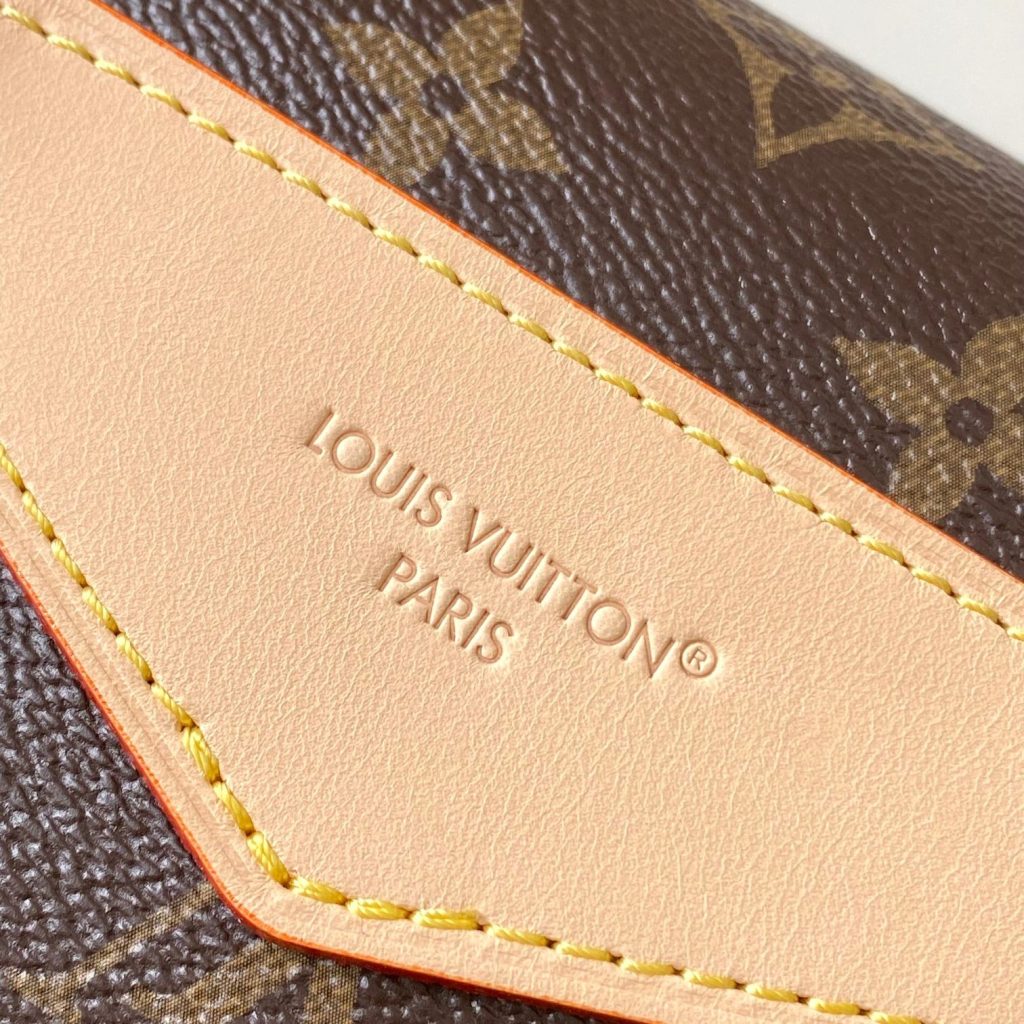 Louis Vuitton Odysée in Monogram Canvas with Drawstring and Flap for Shoulder Crossbody Carry