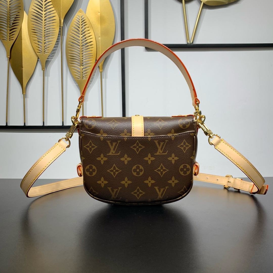 Louis Vuitton Saumur in Monogram Canvas and Natural Leather with Flap Closure for Handheld Carry