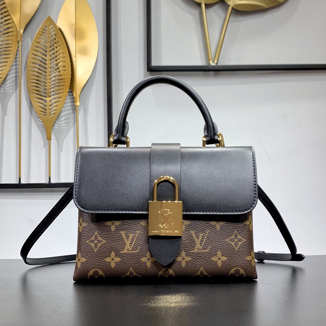 Louis Vuitton Locky BB in Monogram Canvas and Black Leather with Flap Closure for Handheld Carry
