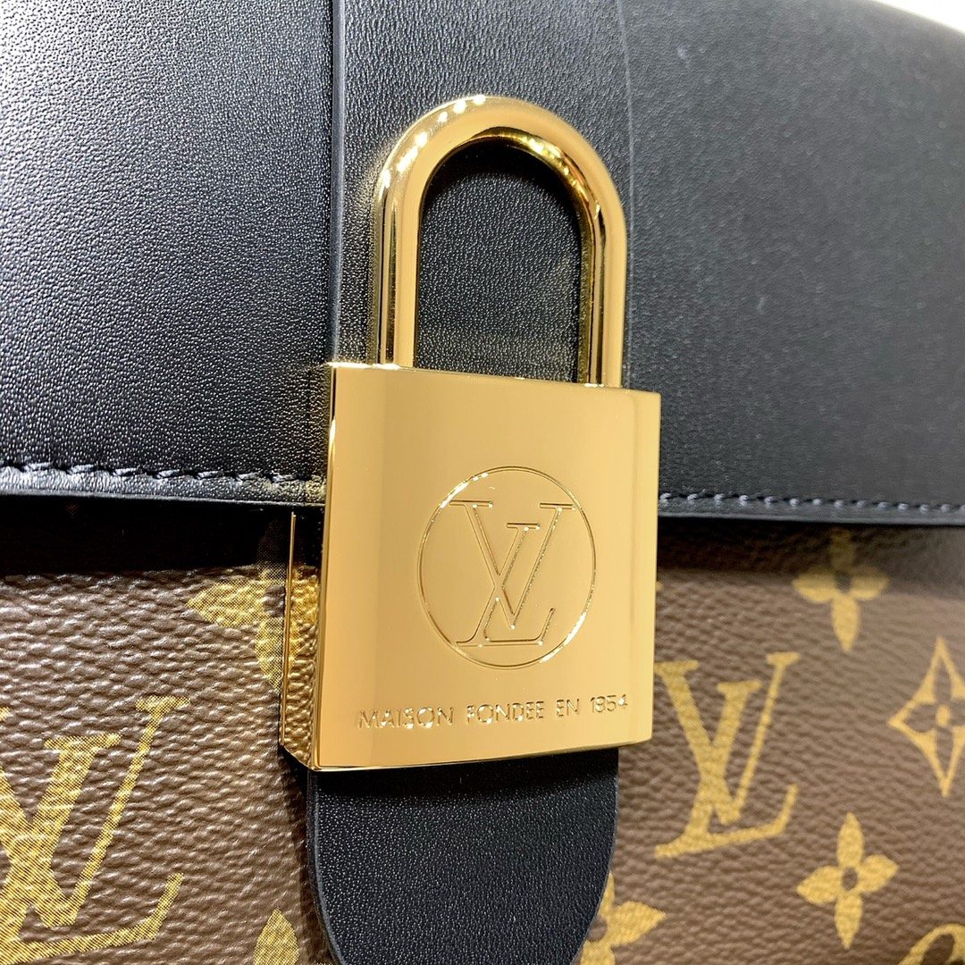 Louis Vuitton Locky BB in Monogram Canvas and Black Leather with Flap Closure for Handheld Carry