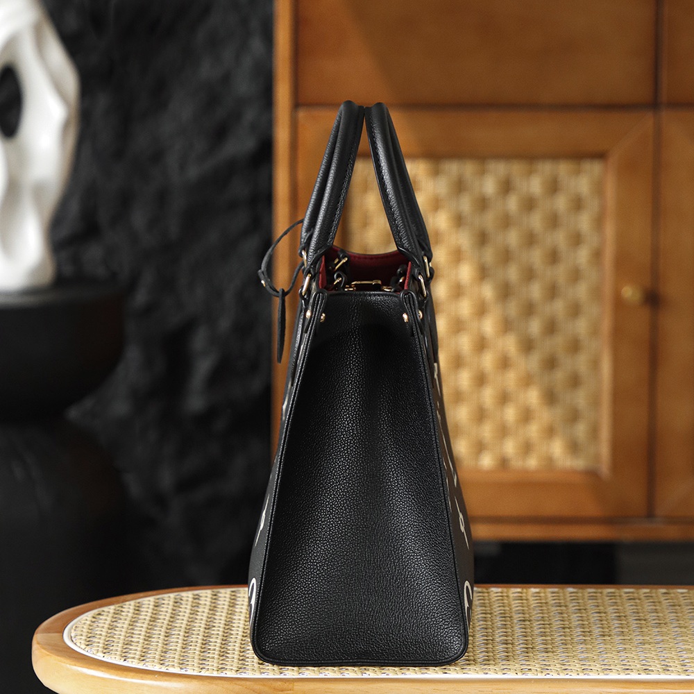 Louis Vuitton OnTheGo MM in Black Monogram Giant Taurillon Leather with Open Top for Handheld Carry