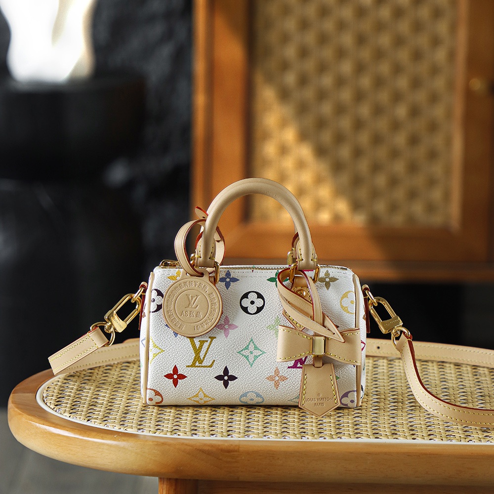 Louis Vuitton Keepall Bandoulière 25 in Monogram Multicolore Canvas / Natural Cowhide Leather Trim