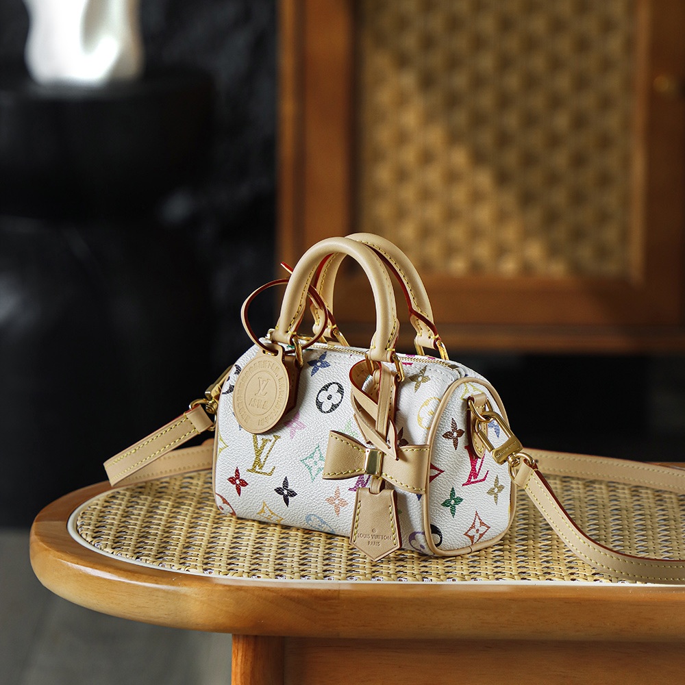Louis Vuitton Keepall Bandoulière 25 in Monogram Multicolore Canvas / Natural Cowhide Leather Trim