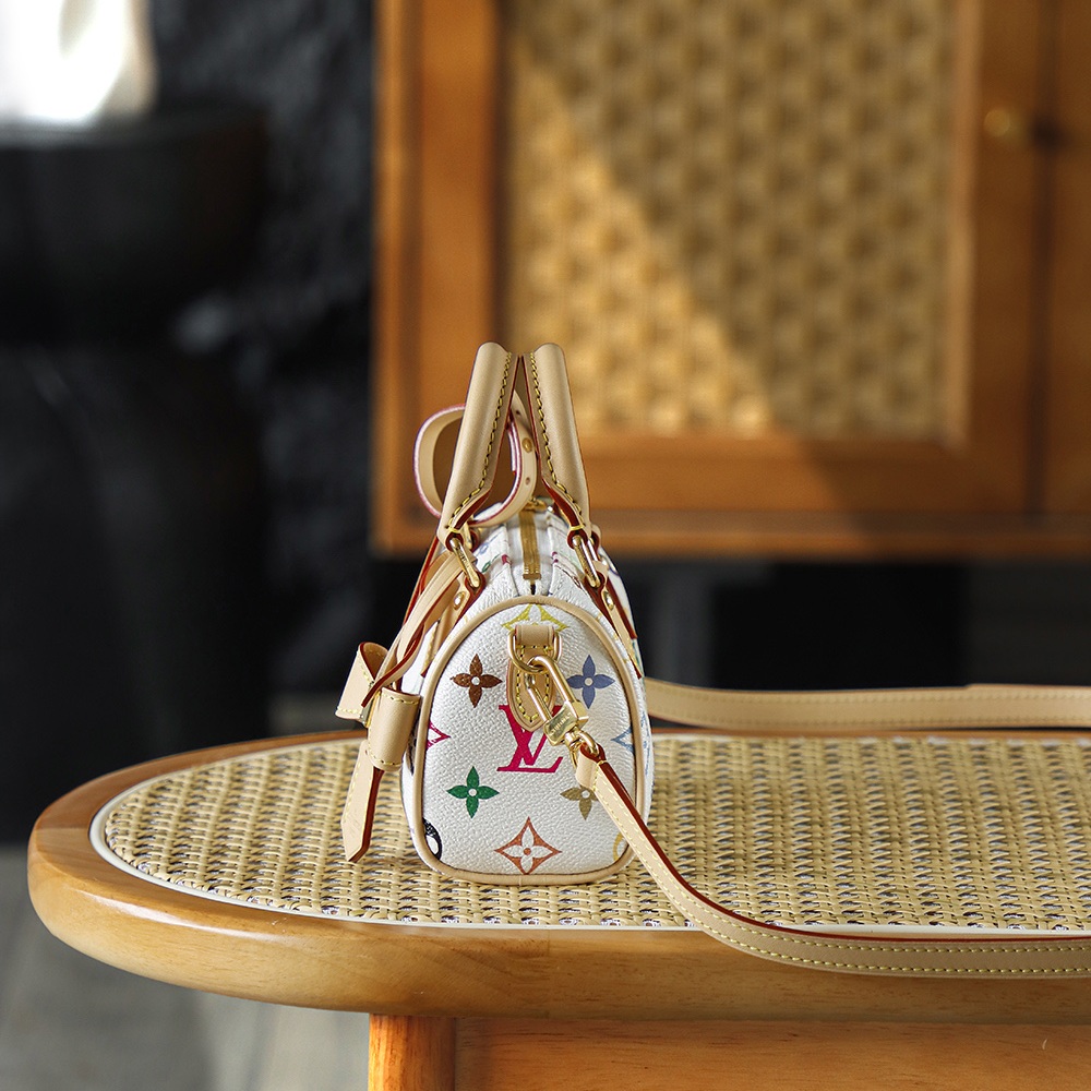 Louis Vuitton Keepall Bandoulière 25 in Monogram Multicolore Canvas / Natural Cowhide Leather Trim