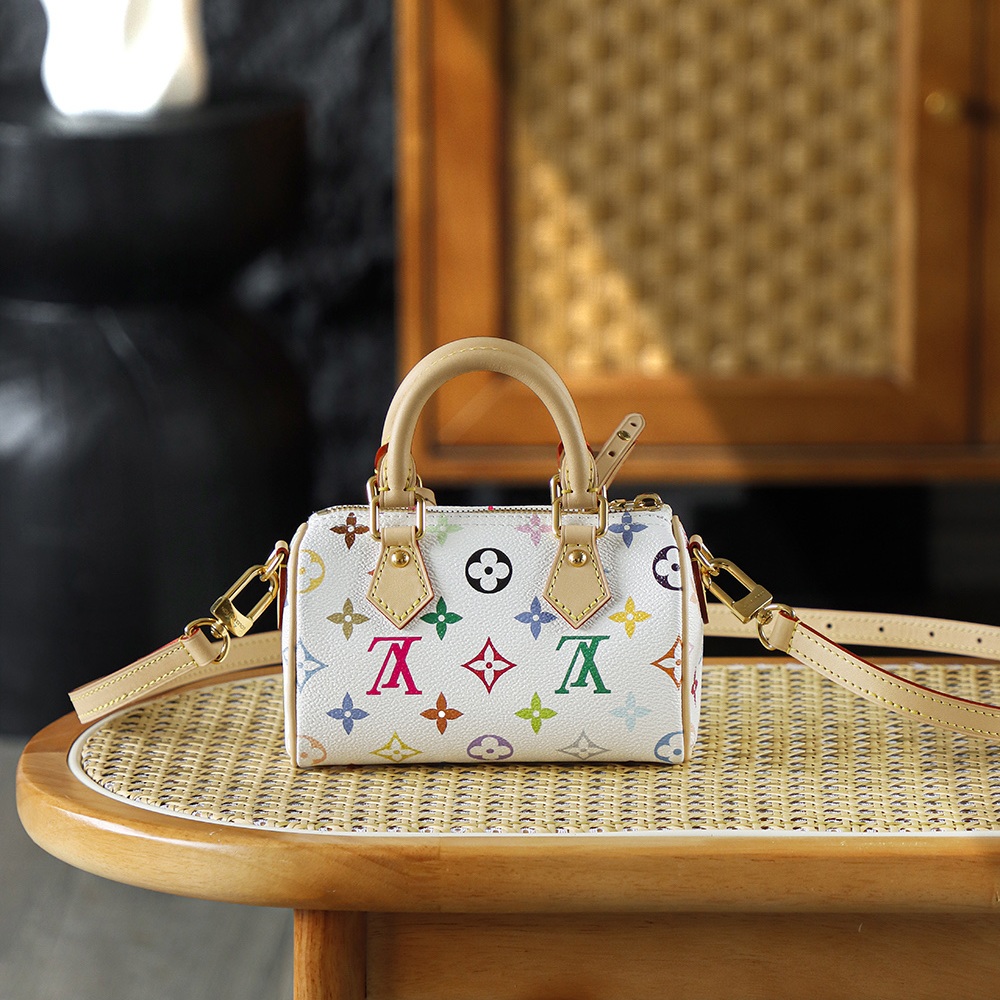 Louis Vuitton Keepall Bandoulière 25 in Monogram Multicolore Canvas / Natural Cowhide Leather Trim