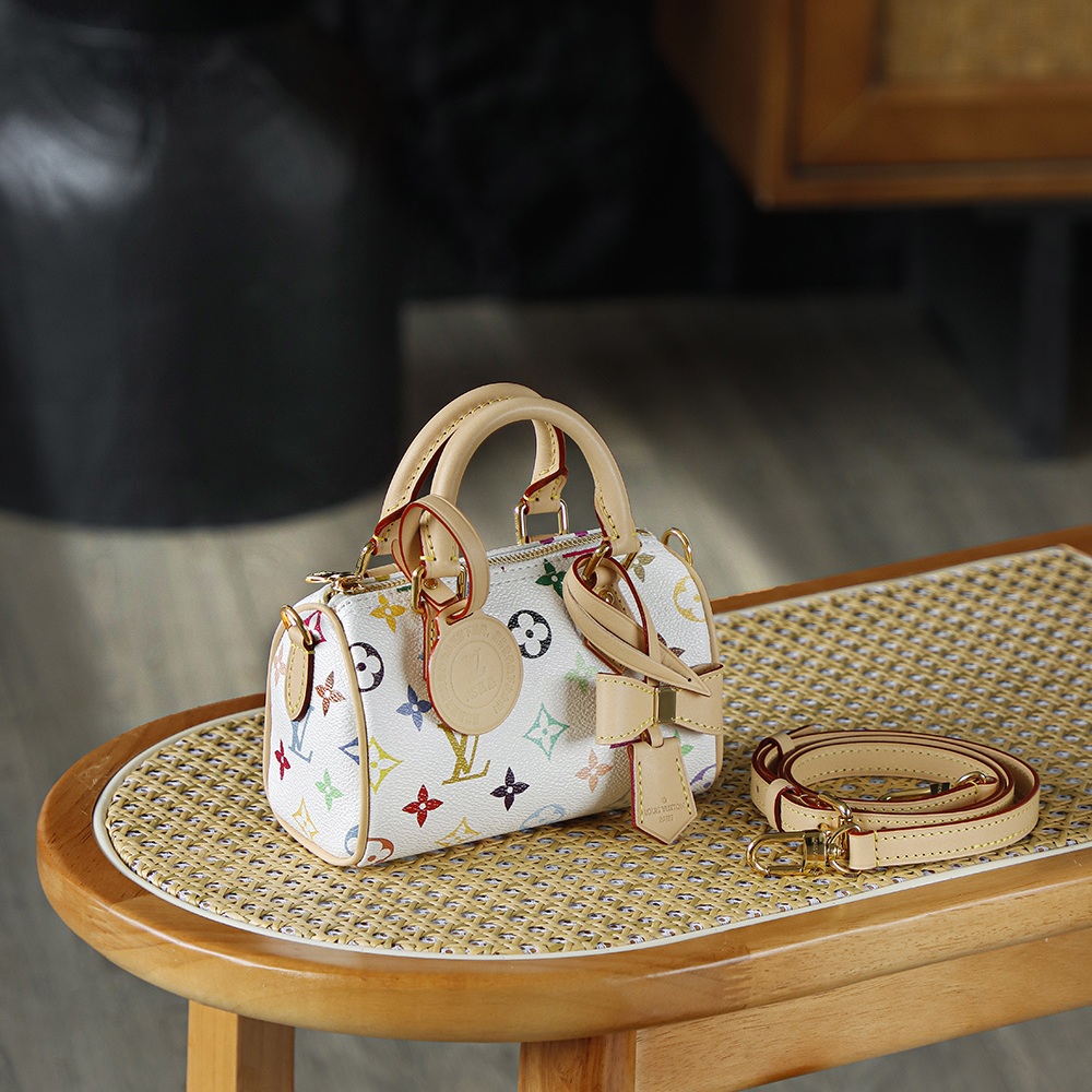 Louis Vuitton Keepall Bandoulière 25 in Monogram Multicolore Canvas / Natural Cowhide Leather Trim