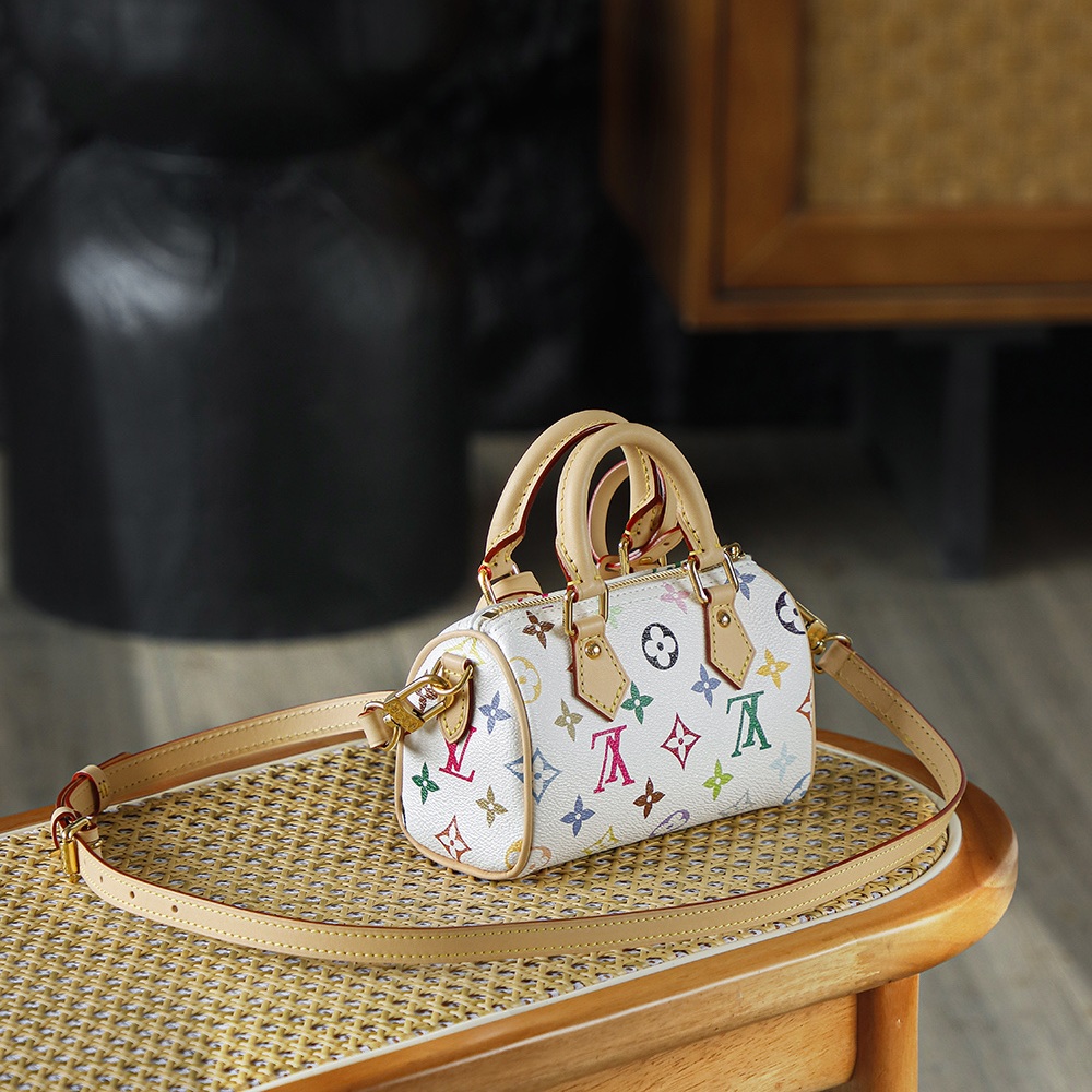 Louis Vuitton Keepall Bandoulière 25 in Monogram Multicolore Canvas / Natural Cowhide Leather Trim