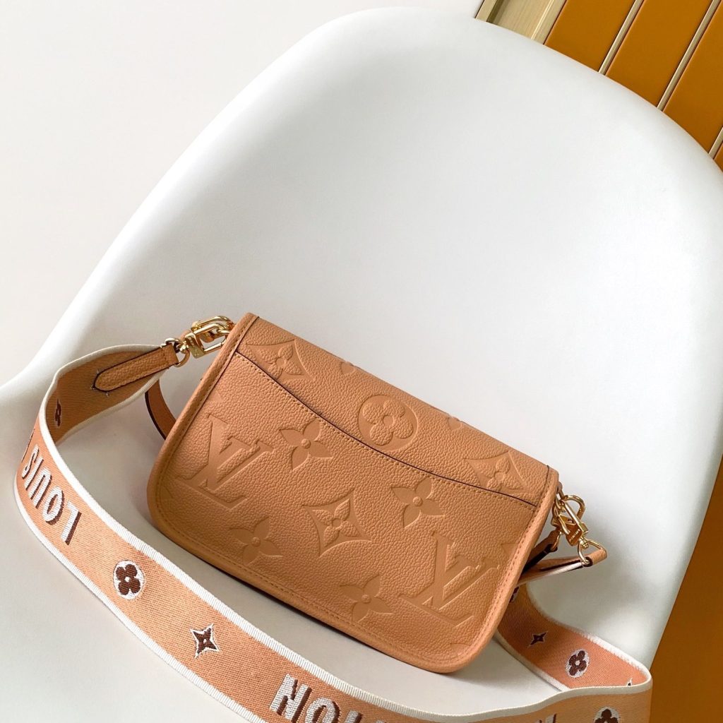 Louis Vuitton Diane in Monogram Empreinte Leather with Magnetic Snap and Buckle Strap for Shoulder