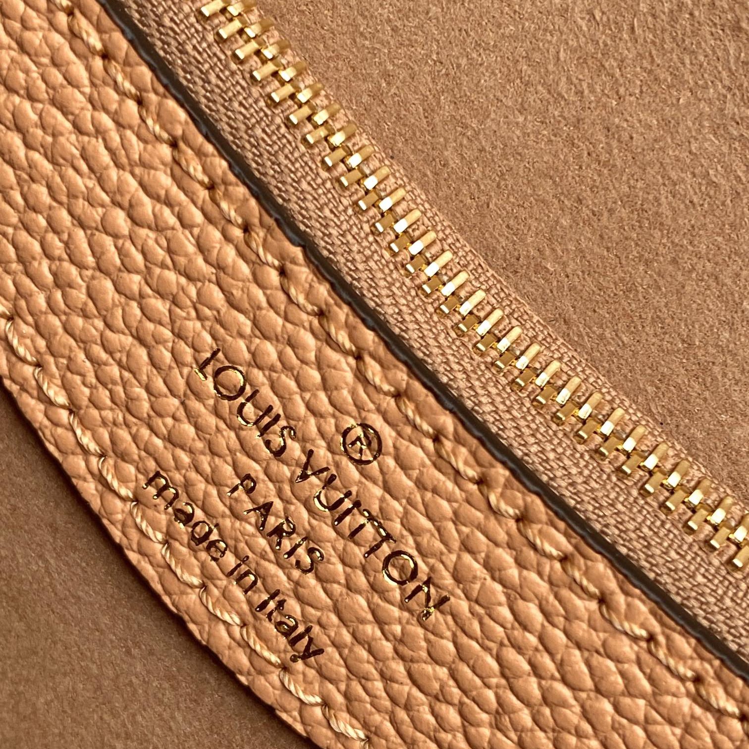 Louis Vuitton Diane in Monogram Empreinte Leather with Magnetic Snap and Buckle Strap for Shoulder