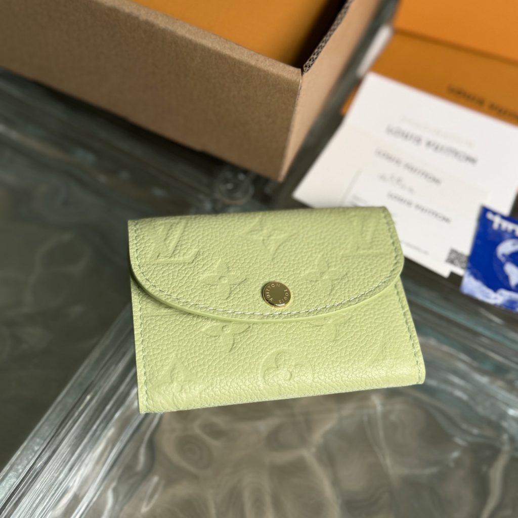 Louis Vuitton Rosalie in Monogram Empreinte Calfskin with Snap Button Flap Closure for Handheld