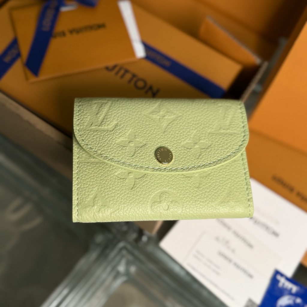Louis Vuitton Rosalie in Monogram Empreinte Calfskin with Snap Button Flap Closure for Handheld