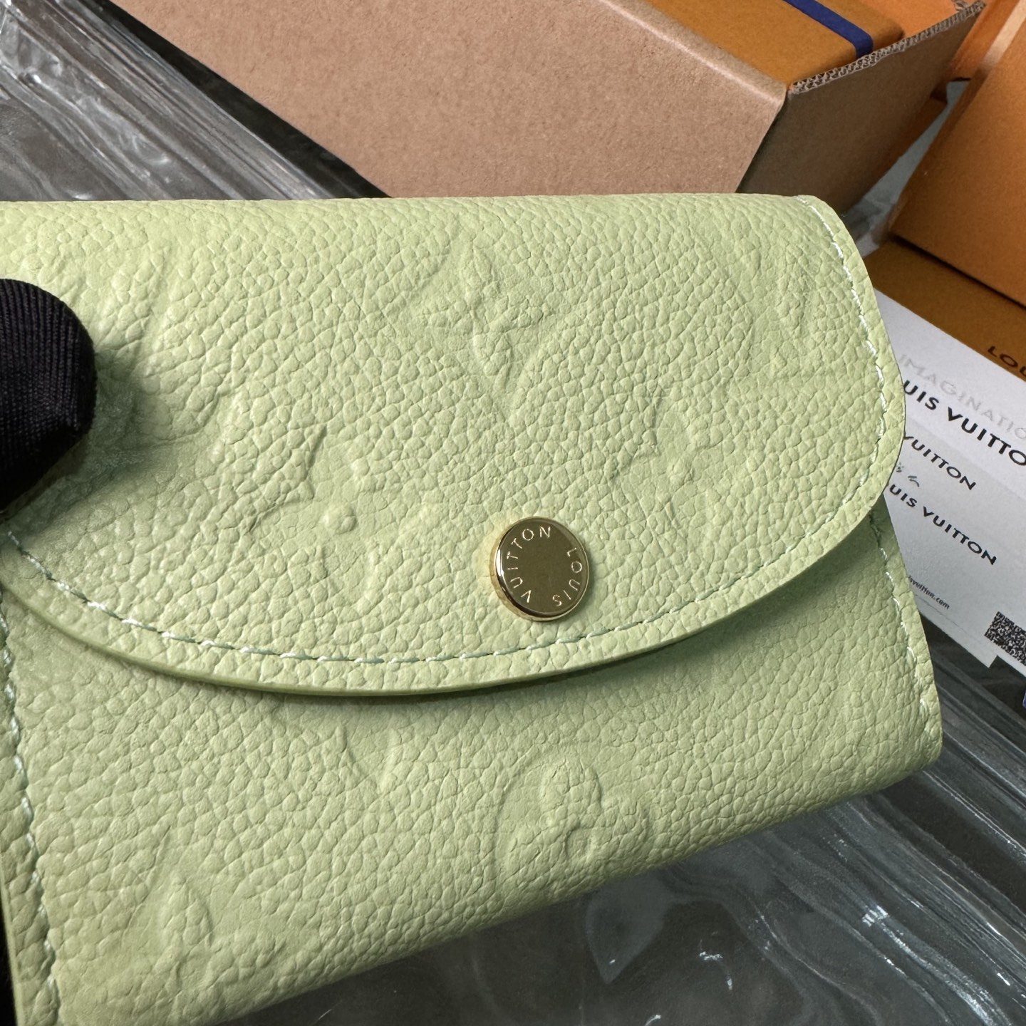 Louis Vuitton Rosalie in Monogram Empreinte Calfskin with Snap Button Flap Closure for Handheld