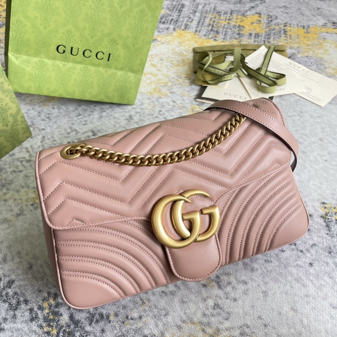 Gucci GG Marmont Medium in Matelassé Leather with Magnetic Snap Closure for Hand and Shoulder Carry