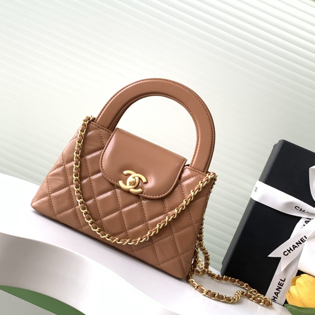 Chanel Kelly Top Handle in Caviar Leather with Turn-lock Flap Closure for Handheld and Shoulder