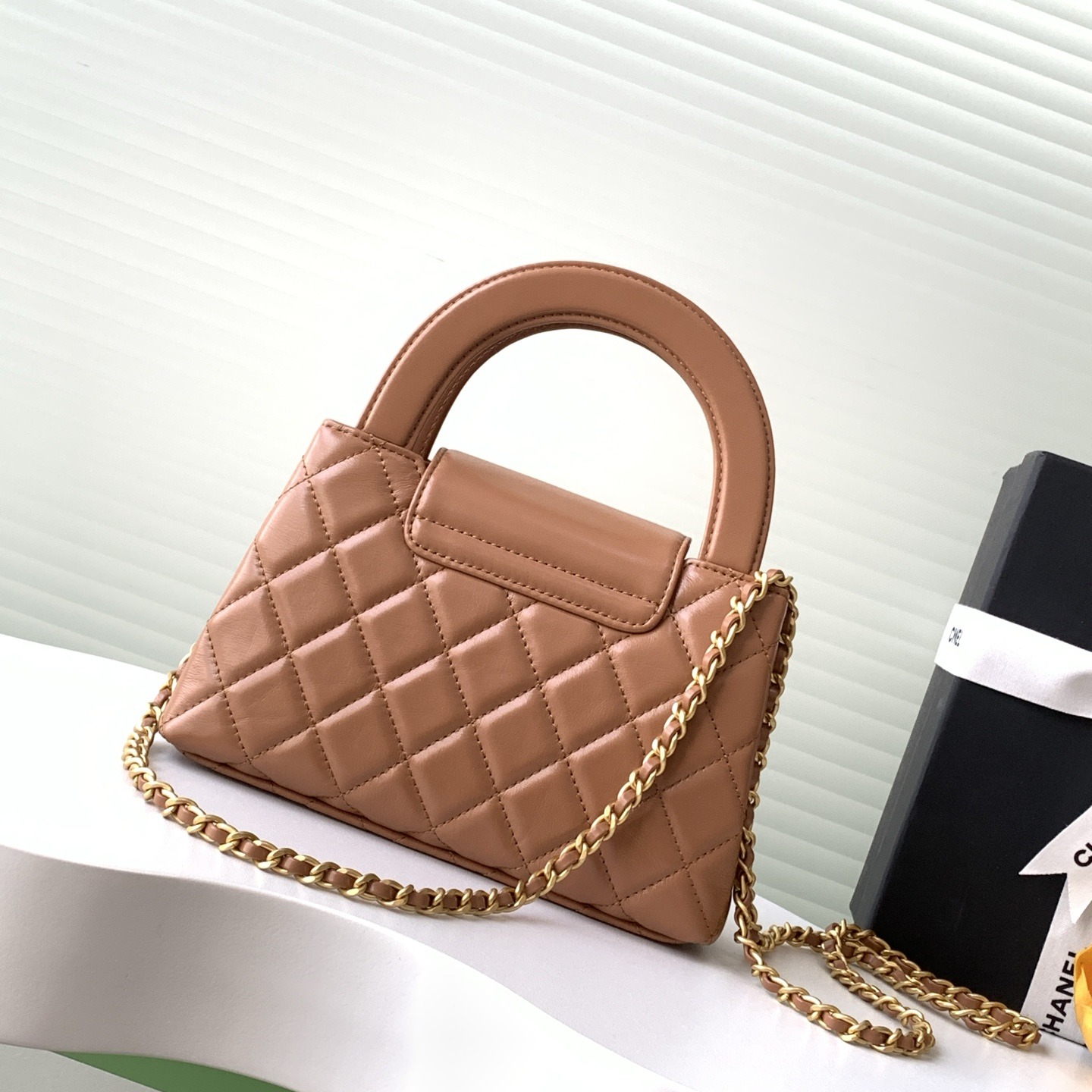 Chanel Kelly Top Handle in Caviar Leather with Turn-lock Flap Closure for Handheld and Shoulder