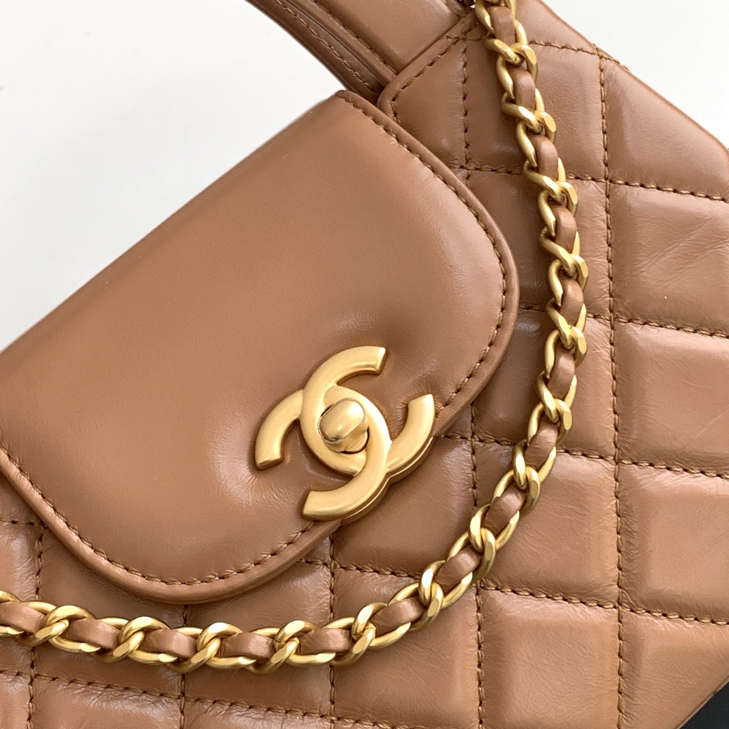 Chanel Kelly Top Handle in Caviar Leather with Turn-lock Flap Closure for Handheld and Shoulder