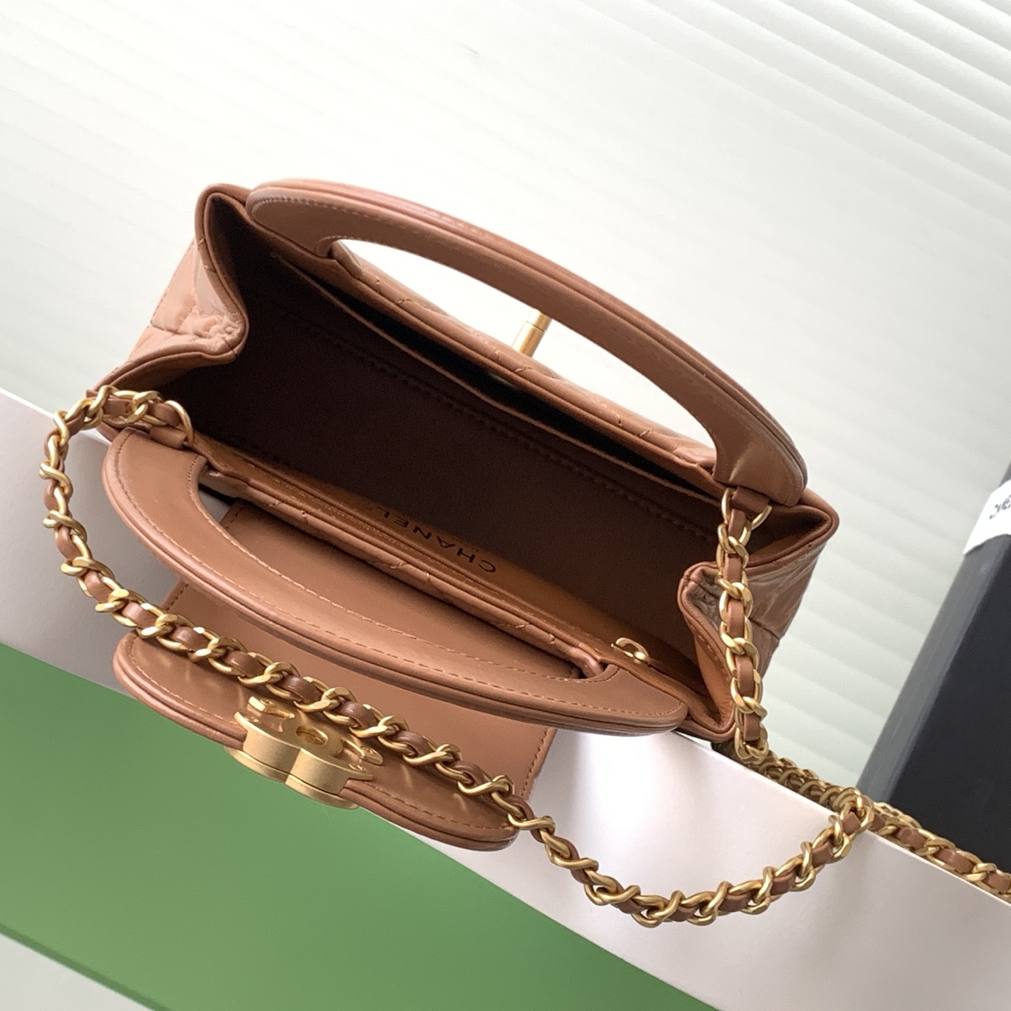 Chanel Kelly Top Handle in Caviar Leather with Turn-lock Flap Closure for Handheld and Shoulder