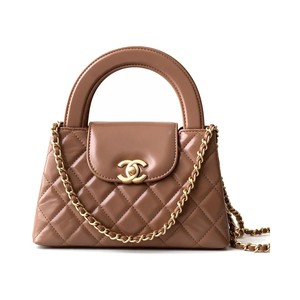 Chanel Kelly Top Handle in Caviar Leather with Turn-lock Flap Closure for Handheld and Shoulder